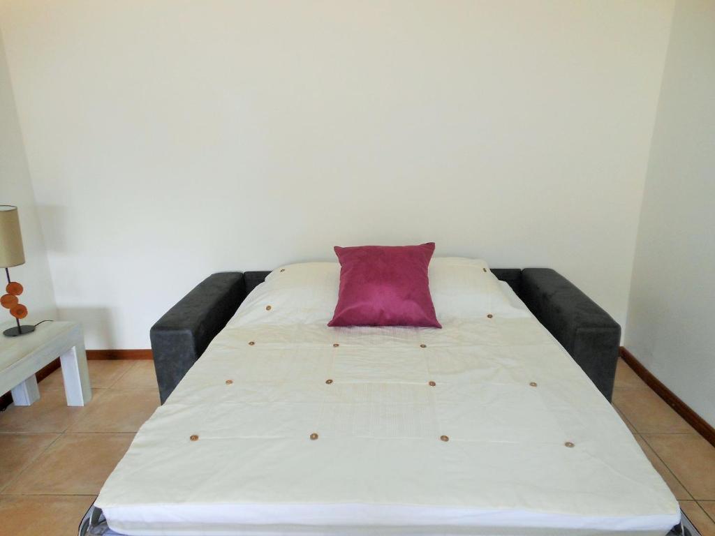 Postel nebo postele na pokoji v ubytování Le Pic De La Buse