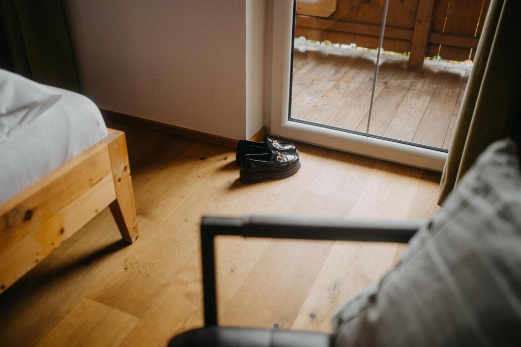 Postel nebo postele na pokoji v ubytování Hotel Alpin Tyrol - Kitzbüheler Alpen