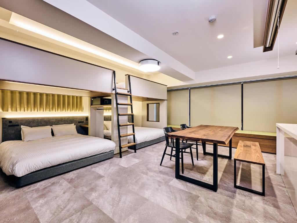 Postel nebo postele na pokoji v ubytování HOTEL ALL IN TOKYO Asakusabashi