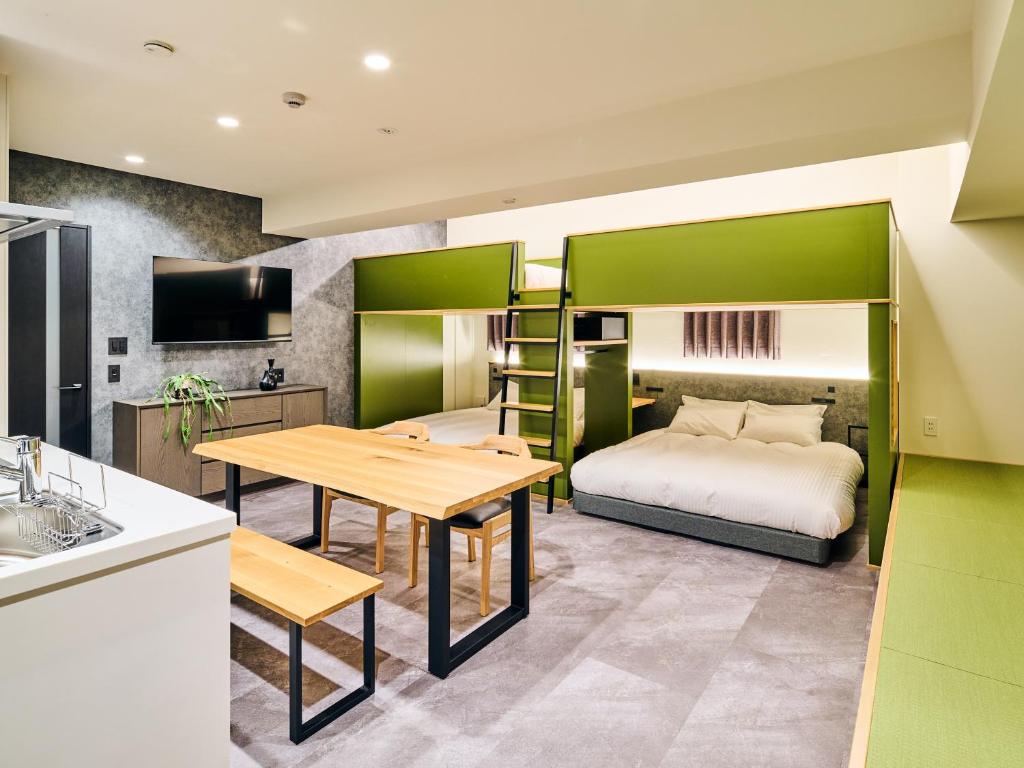 Postel nebo postele na pokoji v ubytování HOTEL ALL IN TOKYO Asakusabashi