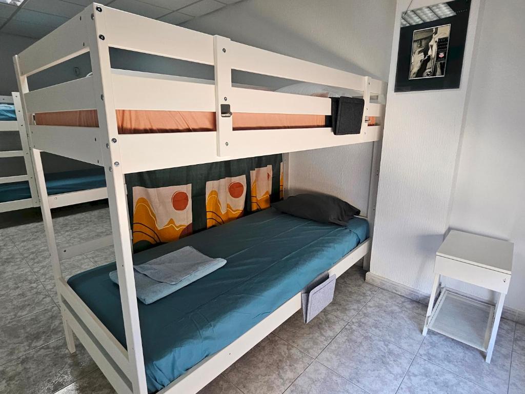 Postel nebo postele na pokoji v ubytování Corralejo Coliving by Amazzzing Travel