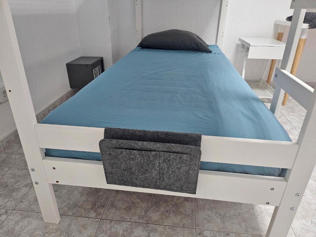 Postel nebo postele na pokoji v ubytování Corralejo Coliving by Amazzzing Travel