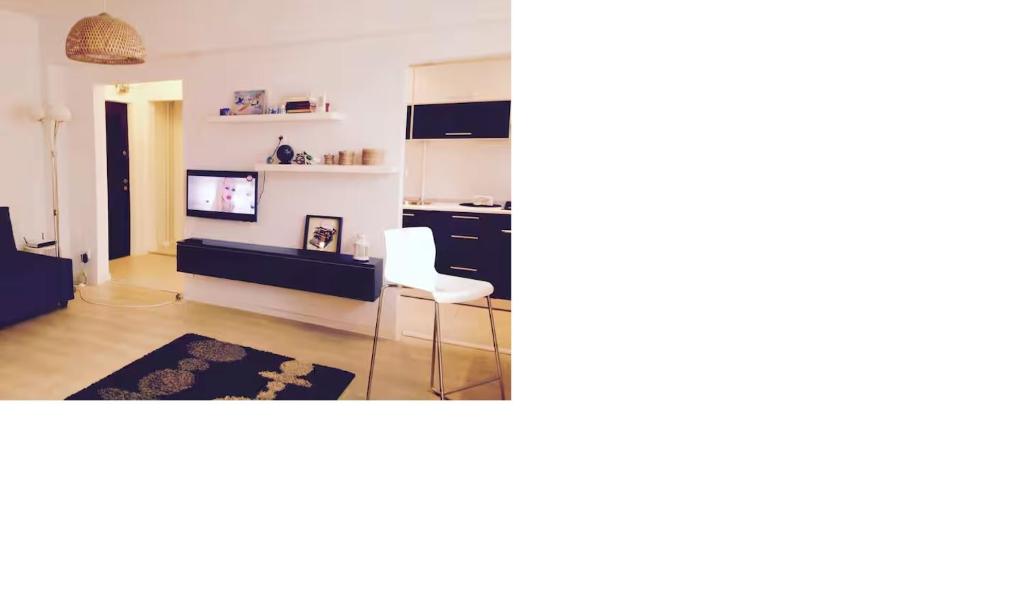 Et tv og/eller underholdning på Cozy Studio - Floreasca/​Dorobanti - Bucharest