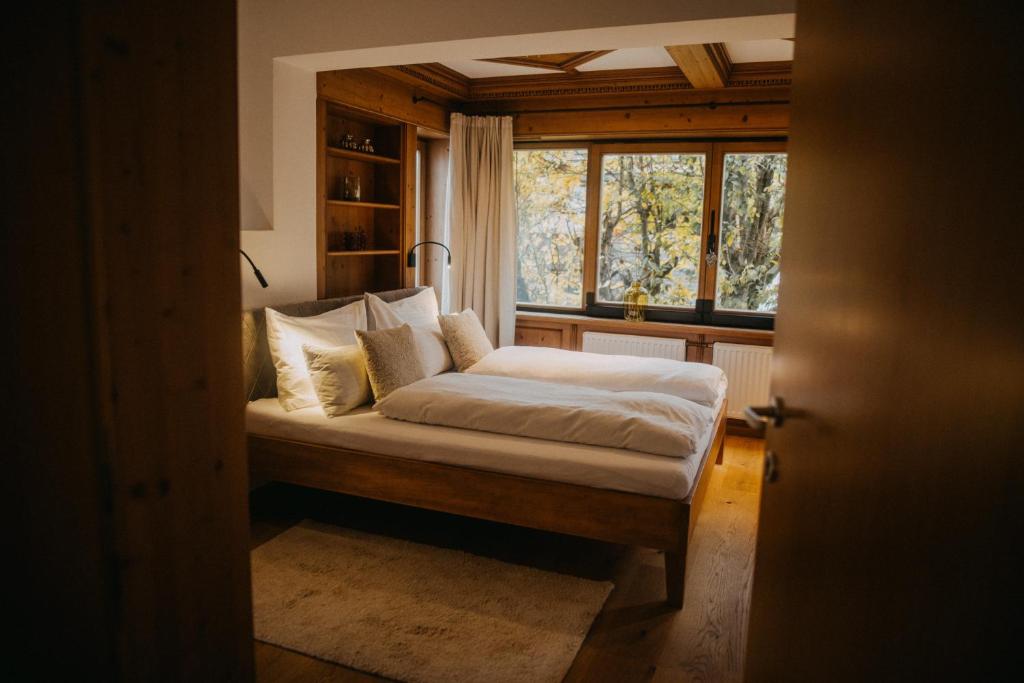 Postel nebo postele na pokoji v ubytování Hotel Alpin Tyrol - Kitzbüheler Alpen