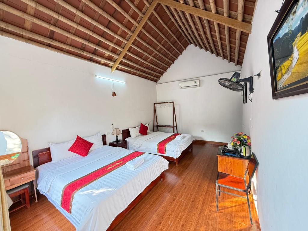 Postel nebo postele na pokoji v ubytování Tam Coc Friendly Homestay