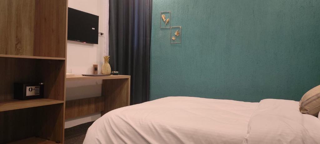 Postel nebo postele na pokoji v ubytování Blue Stone H