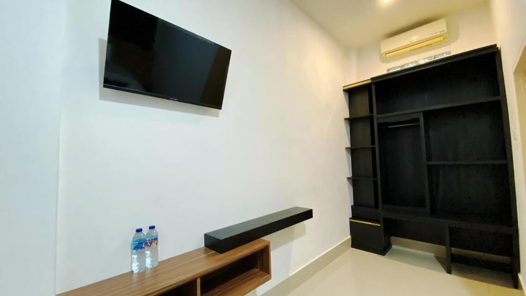 TV a/nebo společenská místnost v ubytování D'Hills Hotel