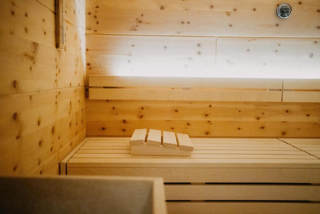Postel nebo postele na pokoji v ubytování Hotel Alpin Tyrol - Kitzbüheler Alpen