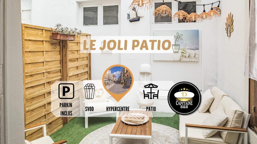 - un salon avec un panneau indiquant si vous devez dans l'établissement Le Joli Patio - Parking Inclus - Hypercentre, à Troyes