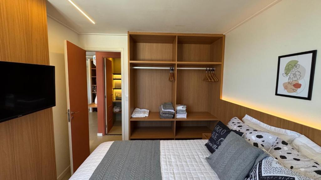 Postel nebo postele na pokoji v ubytování Flat beira-mar, novo!