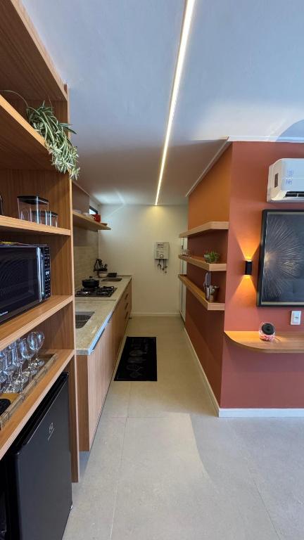 Kuchyň nebo kuchyňský kout v ubytování Flat beira-mar, novo!
