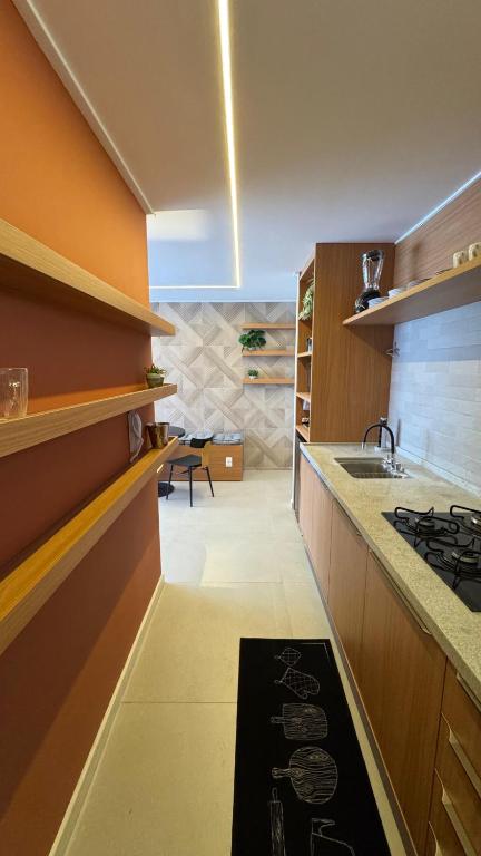 Kuchyň nebo kuchyňský kout v ubytování Flat beira-mar, novo!