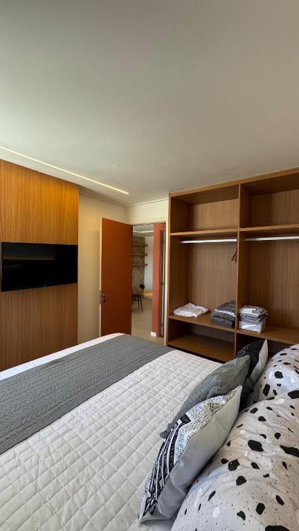 Postel nebo postele na pokoji v ubytování Flat beira-mar, novo!