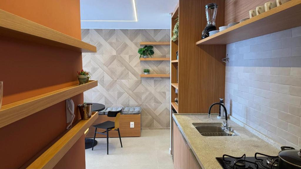 Kuchyň nebo kuchyňský kout v ubytování Flat beira-mar, novo!