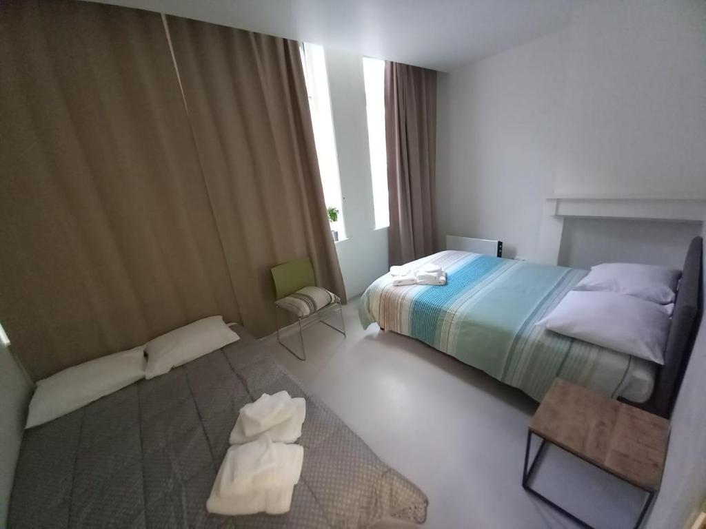 Postel nebo postele na pokoji v ubytování Chez Jean-Claude