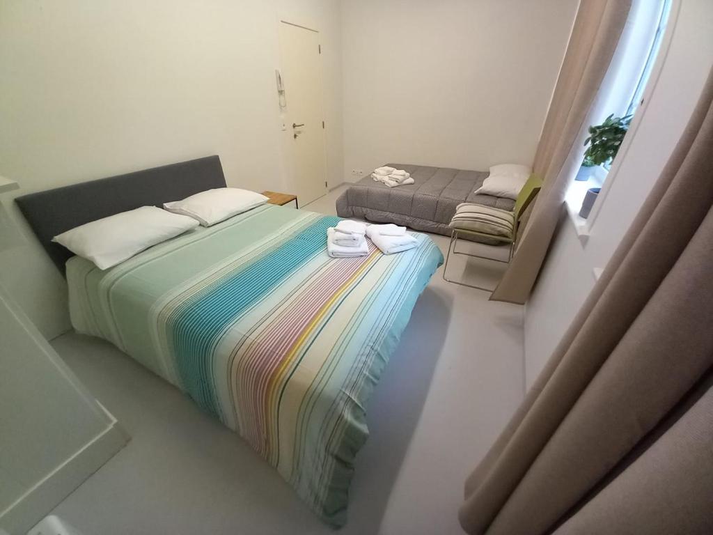 Postel nebo postele na pokoji v ubytování Chez Jean-Claude