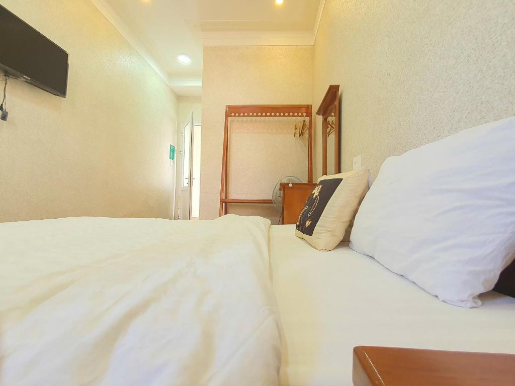 Postel nebo postele na pokoji v ubytování Mindrolling Boutique Hotel