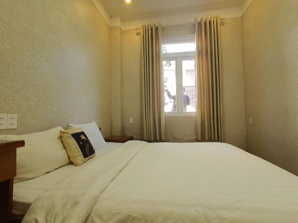 Postel nebo postele na pokoji v ubytování Mindrolling Boutique Hotel