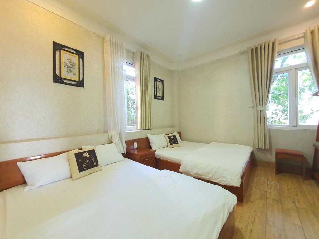 Postel nebo postele na pokoji v ubytování Mindrolling Boutique Hotel