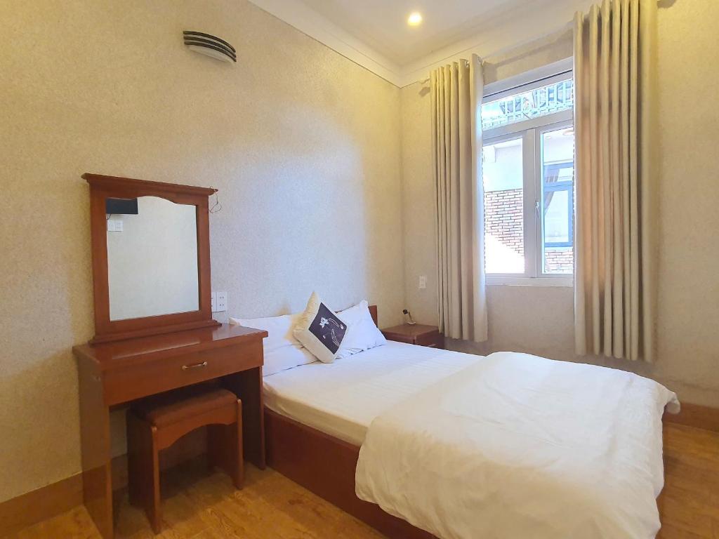 Postel nebo postele na pokoji v ubytování Mindrolling Boutique Hotel