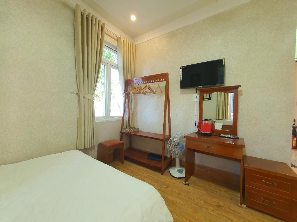 TV a/nebo společenská místnost v ubytování Mindrolling Boutique Hotel