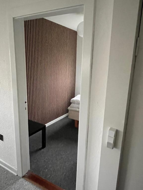 Postel nebo postele na pokoji v ubytování Hyggeligt hus