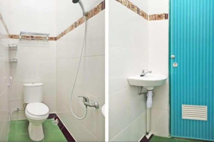 a bathroom with a toilet and a sink at Hotel krui syariah in Krui