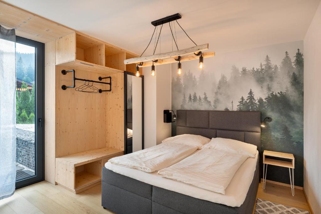 Postel nebo postele na pokoji v ubytování Panorama Lofts Pec