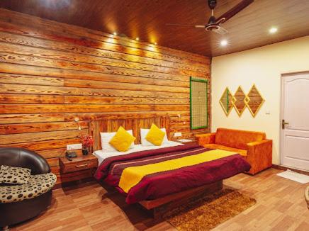 Postel nebo postele na pokoji v ubytování Nirvana Mussoorie