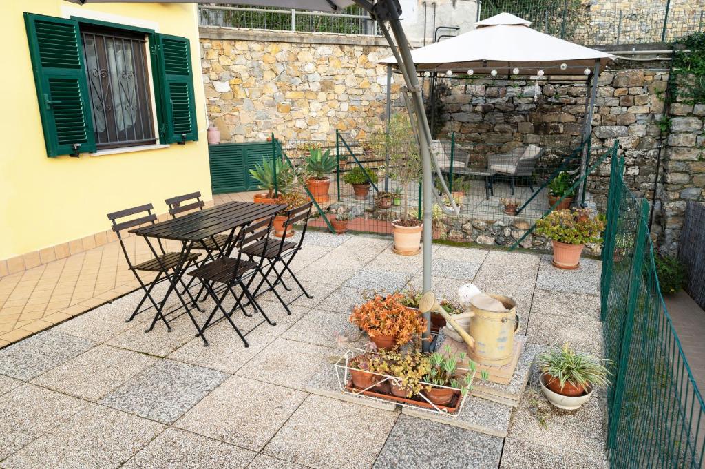 Vonkajšia záhrada v ubytovaní ULIVI - Comodità e tranquillità con Patio e Parcheggio