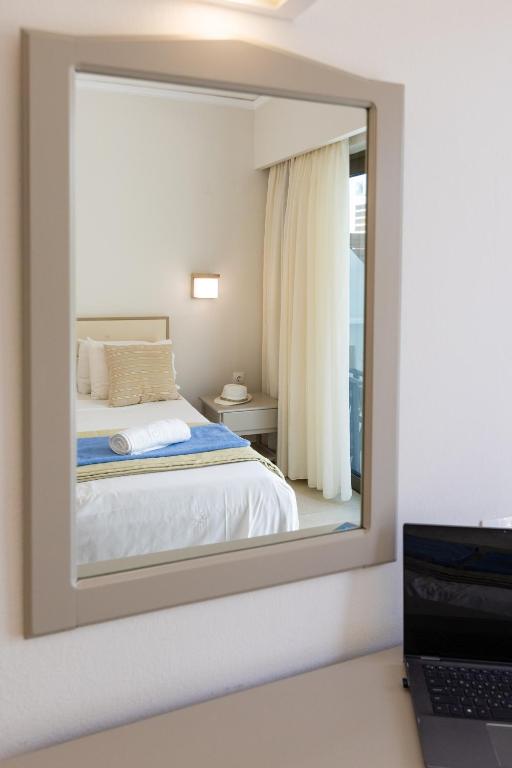 Postel nebo postele na pokoji v ubytování Trefon Hotel Apartments and Family Suites