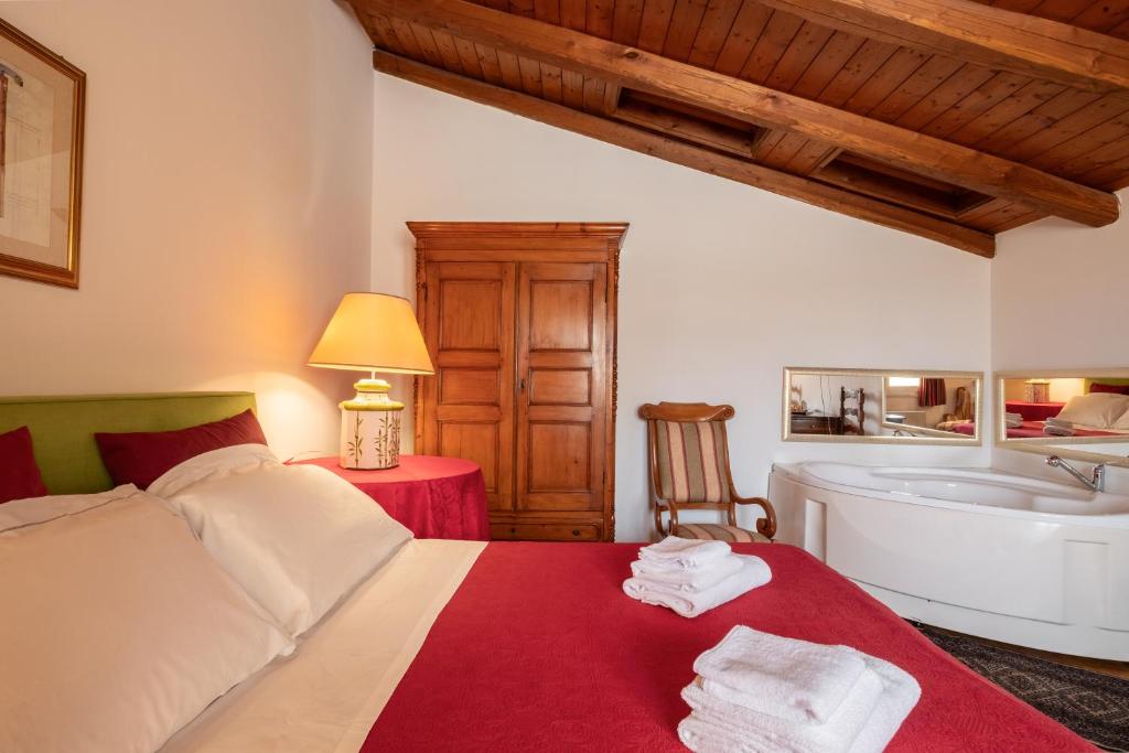 Cama o camas de una habitación en Corte Cristina & Suites