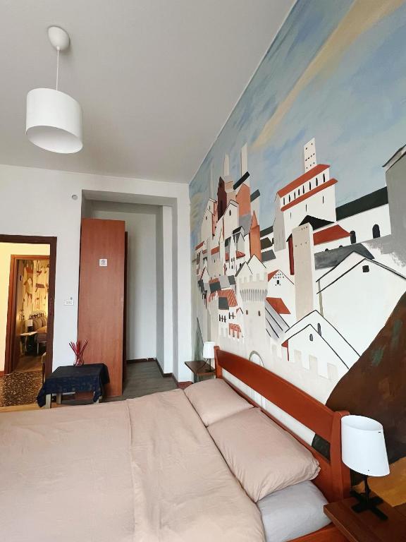 Postel nebo postele na pokoji v ubytování Muse Inn