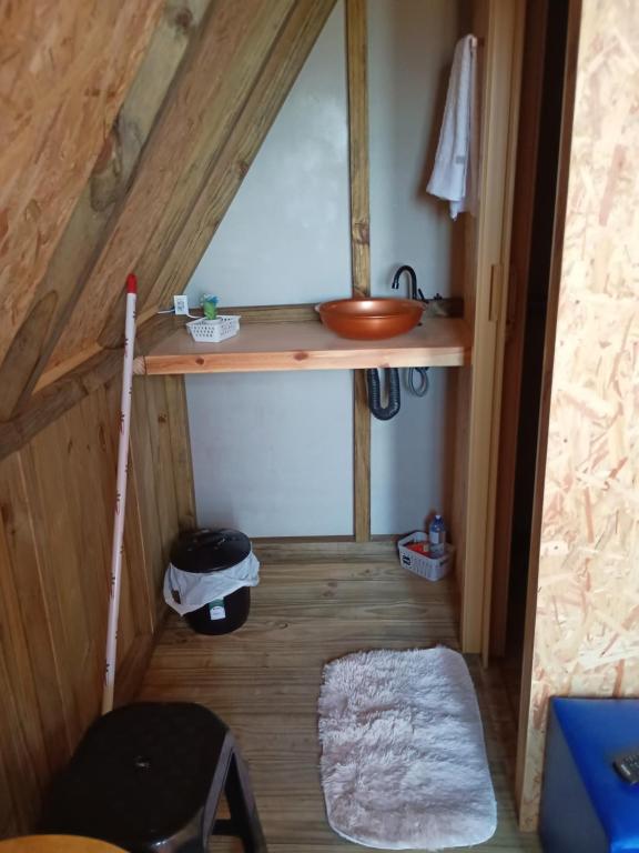 Palanda nebo palandy na pokoji v ubytování Sítio Sao Longuinho