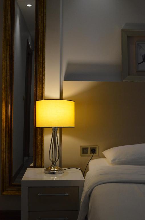 Кровать или кровати в номере Yankı Hotel