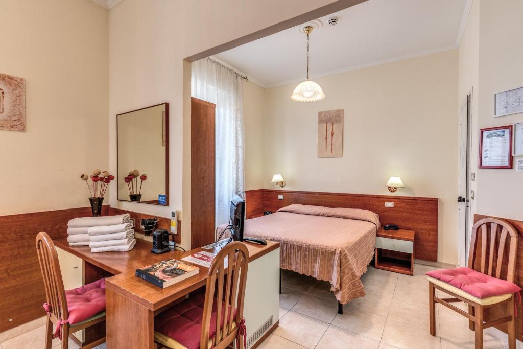 Postel nebo postele na pokoji v ubytování Hotel Katty