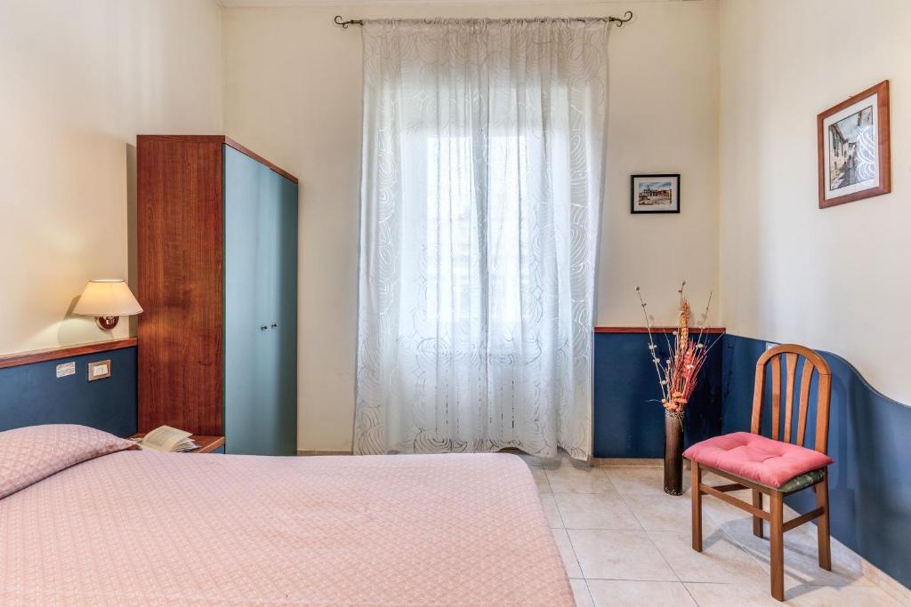 Postel nebo postele na pokoji v ubytování Hotel Katty