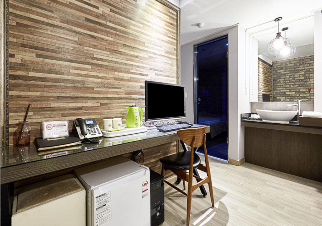 Kuchyň nebo kuchyňský kout v ubytování Regency Hotel