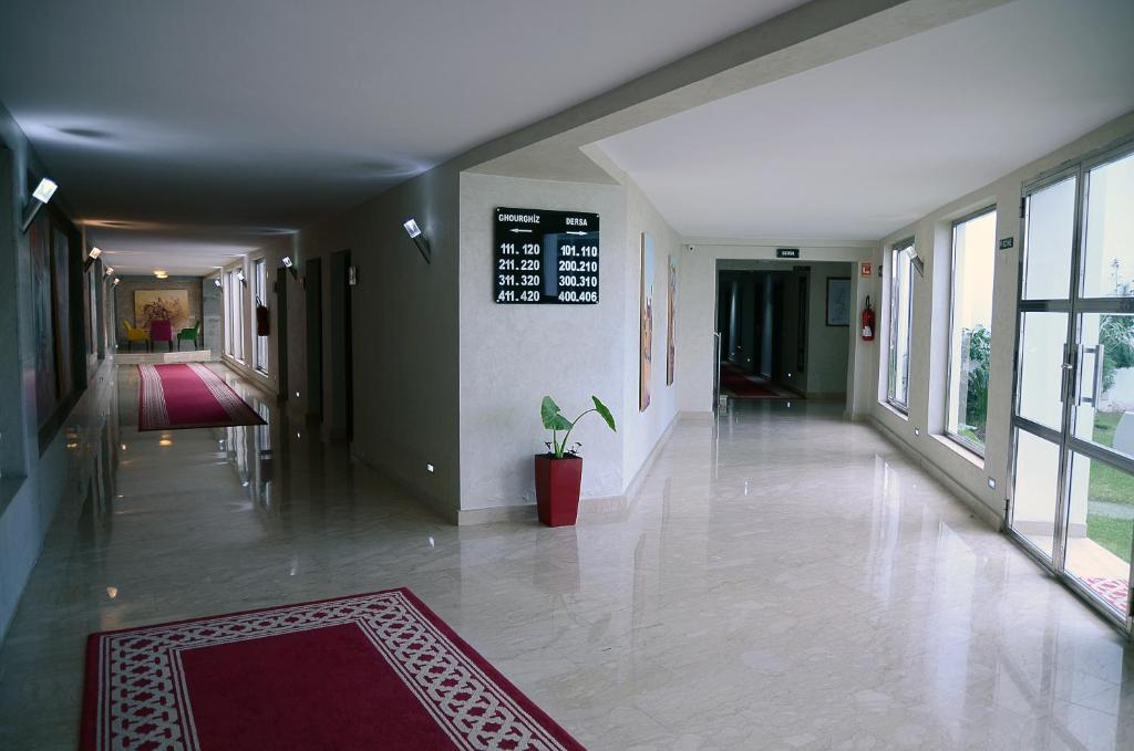 Postel nebo postele na pokoji v ubytování Hotel Chams
