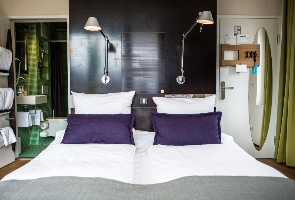Postel nebo postele na pokoji v ubytování Nala Individuellhotel