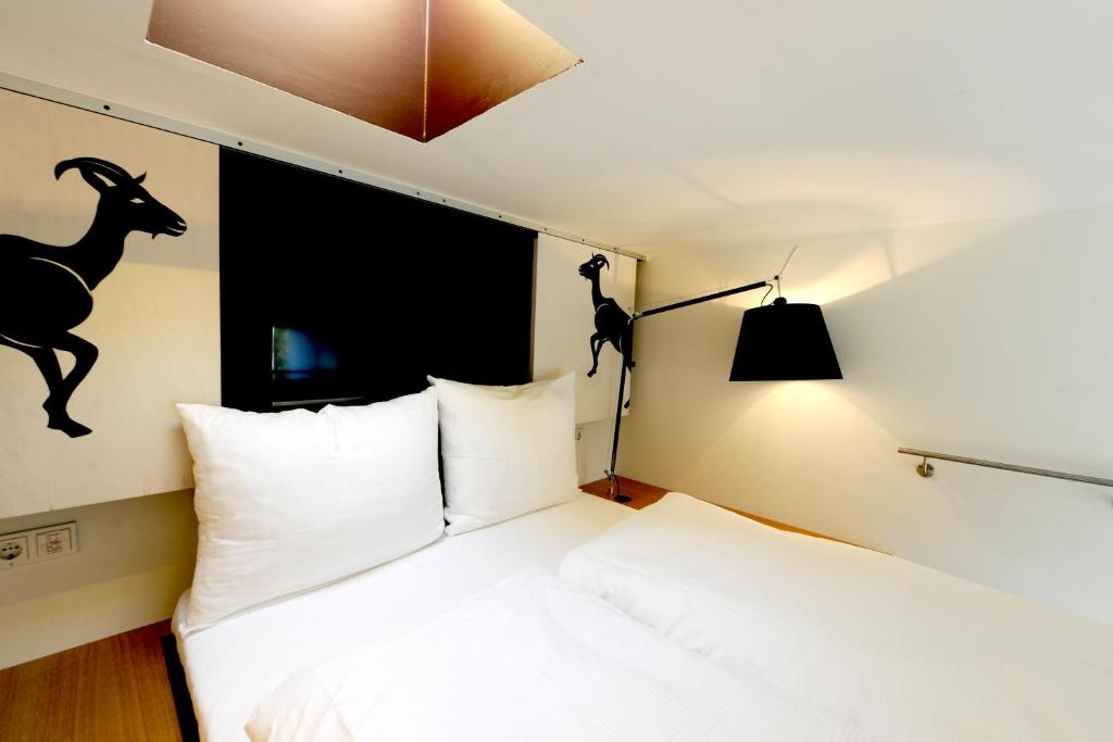 Postel nebo postele na pokoji v ubytování Nala Individuellhotel