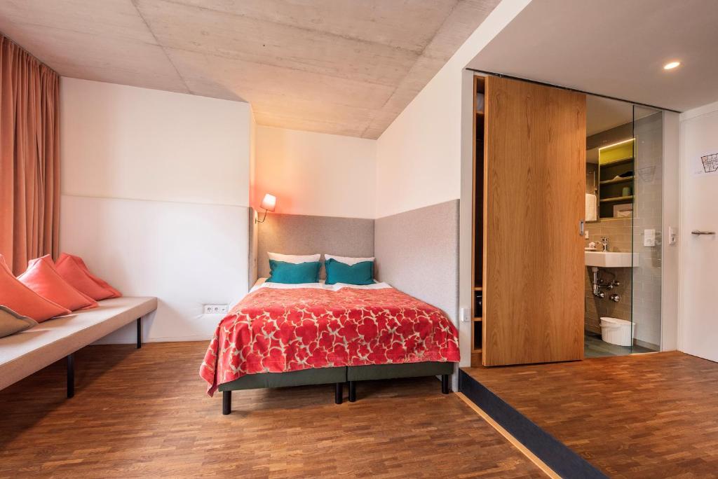 Postel nebo postele na pokoji v ubytování pradl elf my- apartment