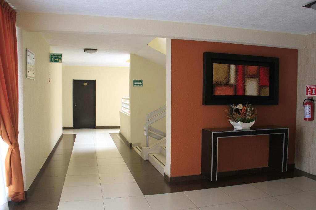 TV a/nebo společenská místnost v ubytování Hotel Estadio