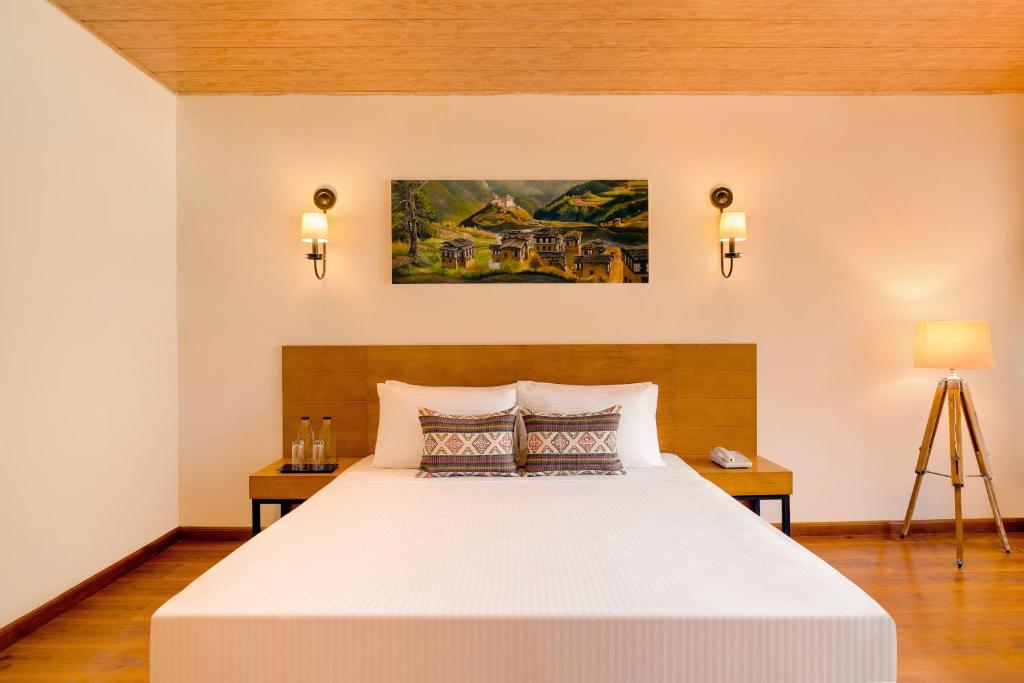 Postel nebo postele na pokoji v ubytování Lemon Tree Resort, Thimphu, Bhutan