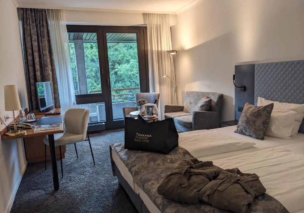 Postel nebo postele na pokoji v ubytování Hotel an der Therme