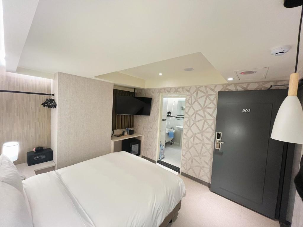 Kuchyň nebo kuchyňský kout v ubytování 新仕飯店-New City Hotel