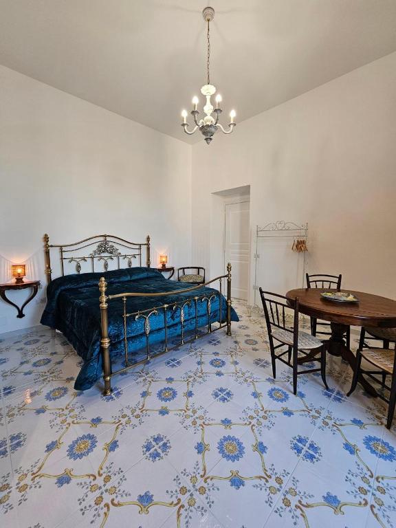 Postel nebo postele na pokoji v ubytování Romeo e Giulietta