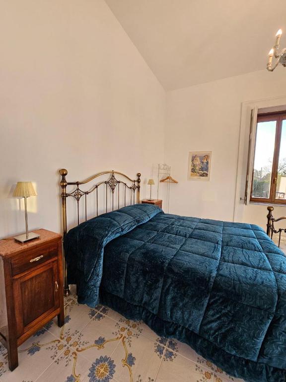Postel nebo postele na pokoji v ubytování Romeo e Giulietta