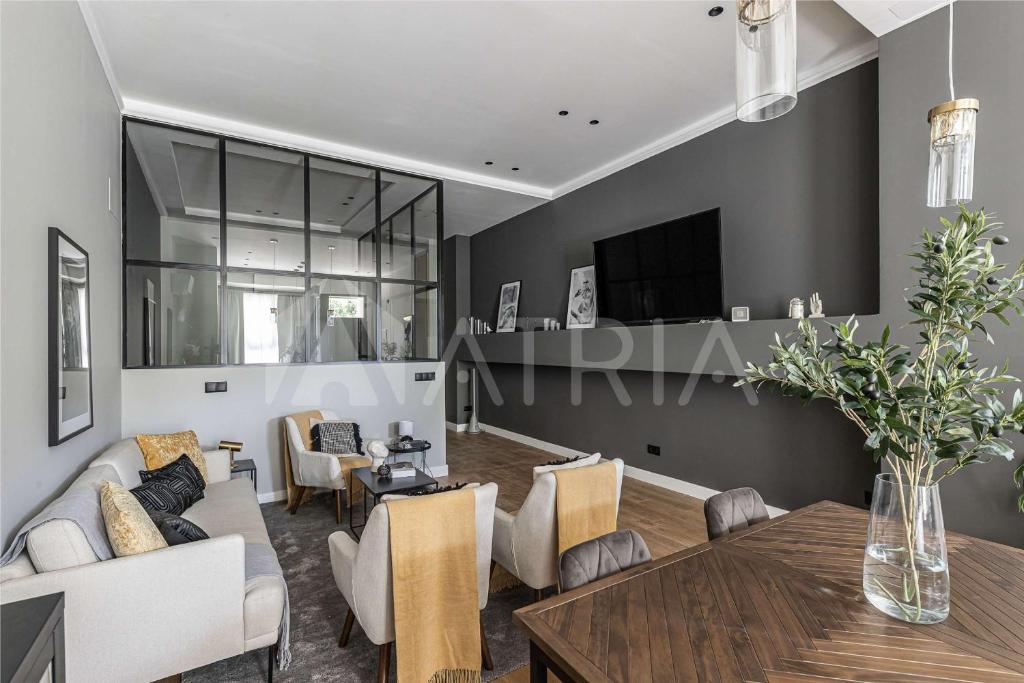 Μια τηλεόραση ή/και κέντρο ψυχαγωγίας στο Designer apartment 4