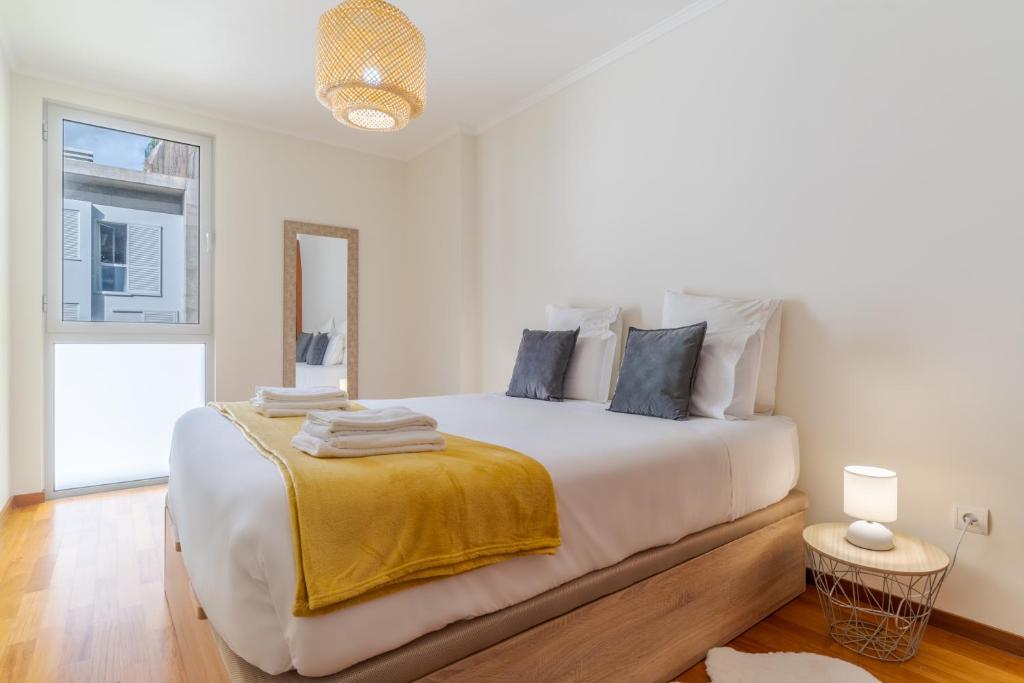 Postel nebo postele na pokoji v ubytování Cozy Santa Cruz